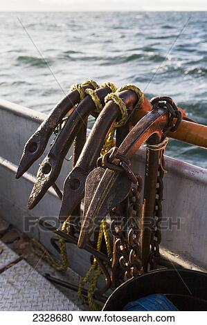 Stock Image - Longline Anchors On The Rail Of The F/V Lucky Dove While Commercial Fishing For Halibut Near King Cove, Alaska Peninsula; Southwest Alaska, United States Of America. Fotosearch