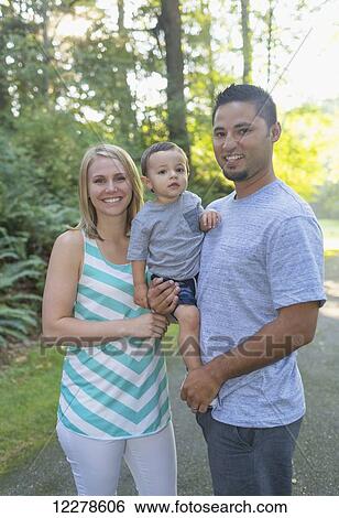 Mixed race parents with a toddler; Mill Creek, Washington, United States of America View Large Photo Image Stock Photograph - Mixed race parents with a toddler; Mill Creek, Washington, United States of America. Fotosearch