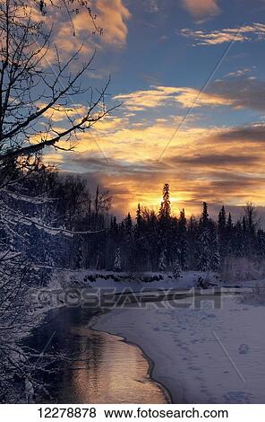 Montana Creek reflects the soft sunset colors of winter near Talkeetna, Southcentral Alaska View Large Photo Image Stock Photo - Montana Creek reflects the soft sunset colors of winter near Talkeetna, Southcentral Alaska. Fotosearch