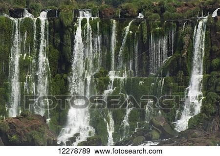 Multiple waterfalls along a fault line in tropical vegetation; Missiones, Argentina View Large Photo Image Stock Photo - Multiple waterfalls along a fault line in tropical vegetation; Missiones, Argentina. Fotosearch