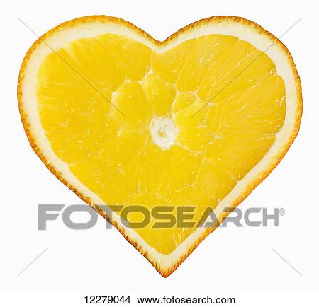 Picture - Orange cut into the shape of a heart on a white background; Montreal, Quebec, Canada. Fotosearch