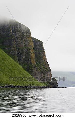 Palisade Cliffs At The End Of The Alaska Peninsula In False Pass Also Known As Isanotski Strait; Alaska, United States Of America View Large Photo Image Stock Image - Palisade Cliffs At The End Of The Alaska Peninsula In False Pass Also Known As Isanotski Strait; Alaska, United States Of America. Fotosearch