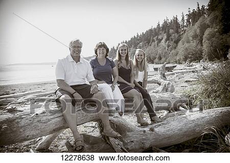 Stock Photo - Portrait of a family on the beach; Whidbey Island, Washington, United States of America. Fotosearch