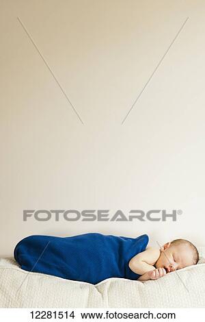 Portrait of a sleeping newborn baby boy; Nashville, Tennessee, United States of America View Large Photo Image Picture - Portrait of a sleeping newborn baby boy; Nashville, Tennessee, United States of America. Fotosearch