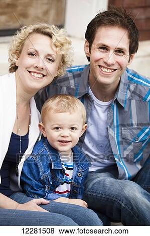 Stock Photo - Portrait of a young family; Nashville, Tennessee, United States of America. Fotosearch