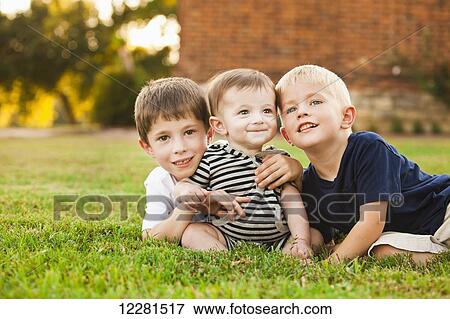 Portrait of three brothers; Nashville, Tennessee, United States of America View Large Photo Image Stock Photo - Portrait of three brothers; Nashville, Tennessee, United States of America. Fotosearch