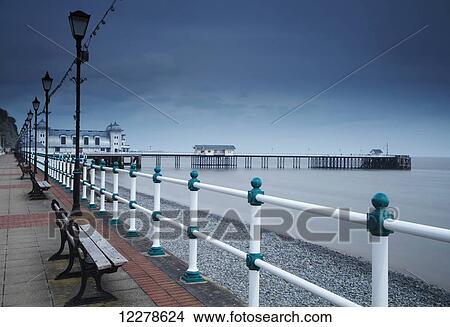 Picture - Promenade and pier in Penarth town outside Cardiff in South Wales; Penarth, Wales. Fotosearch
