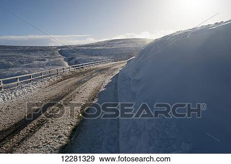 Stock Photo - Roads high in the Yorkshire Dales in very wintery conditions; Yorkshire, England. Fotosearch