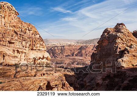 Rugged Landscape Of Mountains And Hills; Petra, Jordan View Large Photo Image Stock Photo - Rugged Landscape Of Mountains And Hills; Petra, Jordan. Fotosearch