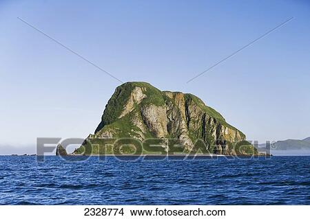 Sankin Island In Ikatan Bay In False Pass, Also Known As Isanotski Strait; Southwest Alaska, United States Of America View Large Photo Image Picture - Sankin Island In Ikatan Bay In False Pass, Also Known As Isanotski Strait; Southwest Alaska, United States Of America. Fotosearch