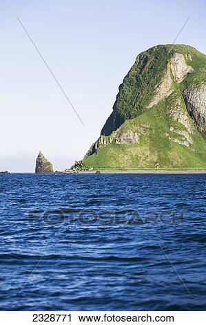 Stock Image - Sankin Island In Ikatan Bay In False Pass, Also Known As Isanotski Strait; Southwest Alaska, United States Of America. Fotosearch