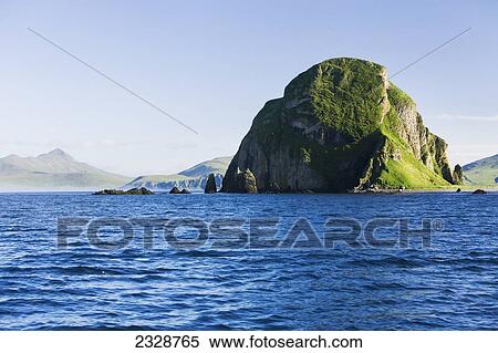 Sankin Island In Ikatan Bay In False Pass, Also Known As Isanotski Strait; Southwest Alaska, United States Of America View Large Photo Image Stock Photography - Sankin Island In Ikatan Bay In False Pass, Also Known As Isanotski Strait; Southwest Alaska, United States Of America. Fotosearch