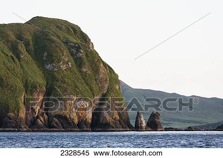 Sankin Island In Ikatan Bay, Near False Pass; Southwest Alaska, United States Of America View Large Photo Image Stock Photography - Sankin Island In Ikatan Bay, Near False Pass; Southwest Alaska, United States Of America. Fotosearch