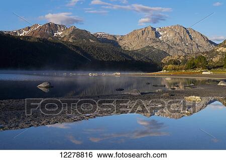 Stock Photograph - Scenic view of June Lake at sunrise in Mono Basin in the Eastern Sierras; California, United States of America. Fotosearch