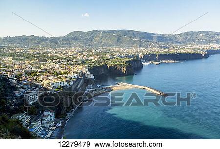 Stock Photo - Scenic view of the wide landscape, city view and Mediterranean Sea from the coastal drive of Sorento, Italy on the Amalfi Coast; Sorento, Province of Salerno, Italy. Fotosearch
