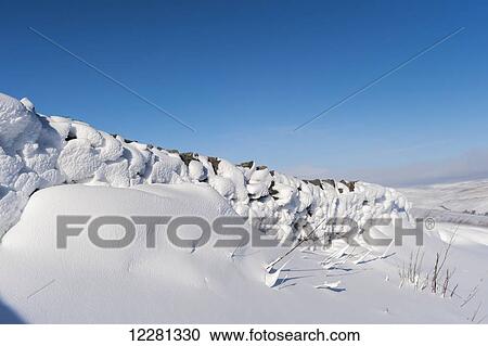 Snow drift patterns after a snowstorm; Yorkshire, Dales, England View Large Photo Image Stock Image - Snow drift patterns after a snowstorm; Yorkshire, Dales, England. Fotosearch
