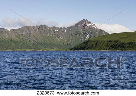 Stock Image - South Walrus Peak Near Cold Bay On The Alaska Peninsula In Summertime; Southwest Alaska, United States Of America. Fotosearch