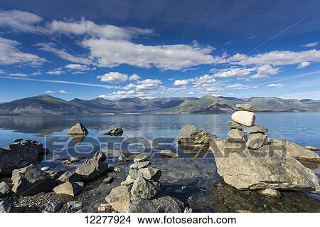 Picture - Stacked rocks along the shoreline of Kluane Lake, Yukon Territory, Canada. Fotosearch