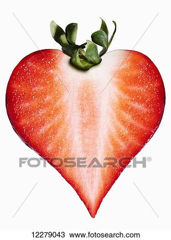 Strawberry in the shape of a heart on a white background; Montreal, Quebec, Canada View Large Photo Image Stock Image - Strawberry in the shape of a heart on a white background; Montreal, Quebec, Canada. Fotosearch