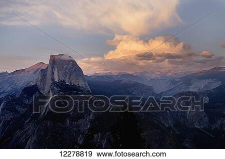 Sunset on Half Dome as seen from Glacier Point, Yosemite National Park; California, United States of America View Large Photo Image Stock Photo - Sunset on Half Dome as seen from Glacier Point, Yosemite National Park; California, United States of America. Fotosearch