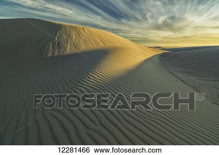 Sunset over the white sand desert in Namakwa National Park; South Africa View Large Photo Image Stock Photograph - Sunset over the white sand desert in Namakwa National Park; South Africa. Fotosearch