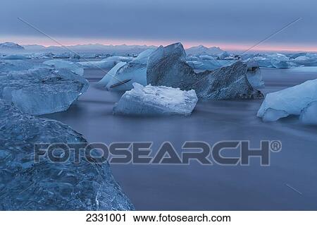 The Iceberg Filled Waters Near Jokulsarlon, Along The South Coast Of Iceland; Iceland View Large Photo Image Stock Image - The Iceberg Filled Waters Near Jokulsarlon, Along The South Coast Of Iceland; Iceland. Fotosearch