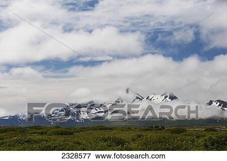 Stock Photo - The Mountainous View From Cold Bay, Alaska Peninsula; Southwest Alaska, United States Of America. Fotosearch