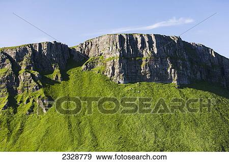 Stock Photo - The Pallisade Cliffs In Ikatan Bay Of False Pass, Also Known As Isanotski Strait, In Summertime; Southwest Alaska, United States Of America. Fotosearch