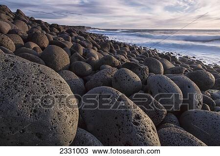 The Rounded Rocks Along The Southwestern Coast Of The Reykjanes Peninsula; Iceland View Large Photo Image Stock Image - The Rounded Rocks Along The Southwestern Coast Of The Reykjanes Peninsula; Iceland. Fotosearch