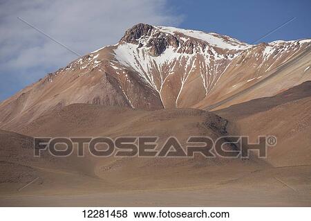 The surreal mountainous landscape of Bolivia's Altilano region; Bolivia View Large Photo Image Stock Photo - The surreal mountainous landscape of Bolivia's Altilano region; Bolivia. Fotosearch