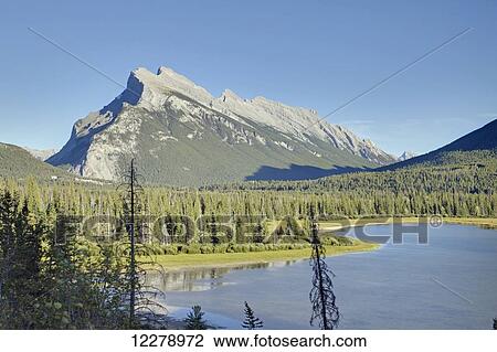 Stock Image - The Vermilion Lakes are a series of lakes located immediately west of Banff, Alberta, in the Canadian Rocky Mountains; Alberta, Canada. Fotosearch