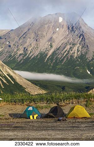 Stock Image - Three Tents In Summertime On Hallo Bay, Katmai Naional Park, Alaska Peninsula; Southwest Alaska, United States Of America. Fotosearch