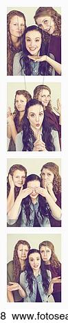 Stock Photo - Three young women creating photo booth series of images in filmstrip format; Alberta, Canada. Fotosearch