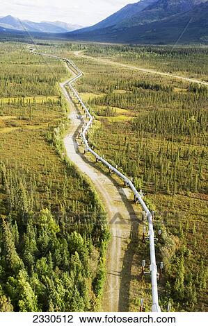 Stock Image - Trans-Alaska Pipeline Through Brooks Range Out To The Noatak River, Arctic Alaska In Summertime; Alaska, United States Of America. Fotosearch
