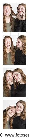 Two young women creating photo booth series of images in filmstrip format; Alberta, Canada View Large Photo Image Stock Image - Two young women creating photo booth series of images in filmstrip format; Alberta, Canada. Fotosearch