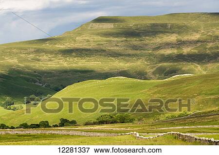 Upland countryside in the Upper Eden near Kirkby Stephen, showing Wharton Fell and Mallerstang Edge; Cumbria, England View Large Photo Image Stock Photo - Upland countryside in the Upper Eden near Kirkby Stephen, showing Wharton Fell and Mallerstang Edge; Cumbria, England. Fotosearch