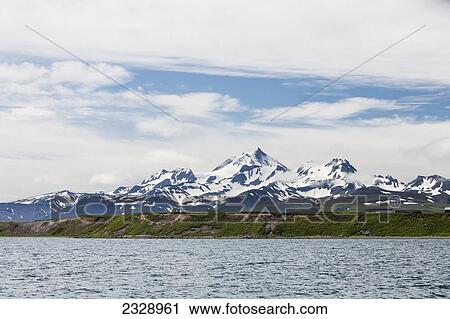 View Of Mount Frosty From The Cold Bay Dock, Alaska Peninsula; Southwest Alaska, United States Of America View Large Photo Image Stock Image - View Of Mount Frosty From The Cold Bay Dock, Alaska Peninsula; Southwest Alaska, United States Of America. Fotosearch