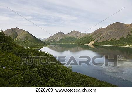 Stock Photo - View Of The City Of King Cove And King Cove Lagoon From Atop A Nearby Mountain In Summertime, Alaska Peninsula; Southwest Alaska, United States Of America. Fotosearch