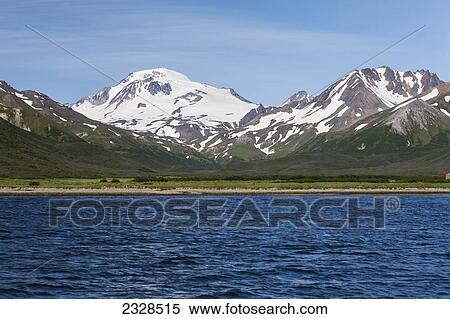 View Of The Mountains Along The Coastline; False Pass, Alaska, United States Of America View Large Photo Image Stock Photography - View Of The Mountains Along The Coastline; False Pass, Alaska, United States Of America. Fotosearch