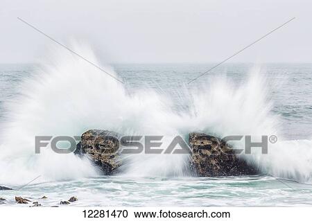 Waves crash over rocks, Namakwaland National Park; South Africa View Large Photo Image Stock Image - Waves crash over rocks, Namakwaland National Park; South Africa. Fotosearch