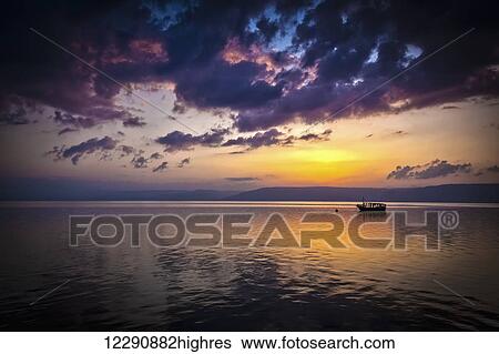A calm settles on the Sea of Galilee, just after a storm; Galilee, Israel View Large Photo Image Stock Photograph - A calm settles on the Sea of Galilee, just after a storm; Galilee, Israel. Fotosearch