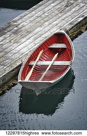 A homemade wooden skiff sits ready at the dock; Halibut Cove, Alaska, United States of America View Large Photo Image Stock Photograph - A homemade wooden skiff sits ready at the dock; Halibut Cove, Alaska, United States of America. Fotosearch