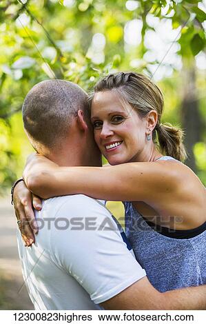 A married couple spending quality time together in a park; Edmonton, Alberta, Canada View Large Photo Image Stock Photograph - A married couple spending quality time together in a park; Edmonton, Alberta, Canada. Fotosearch