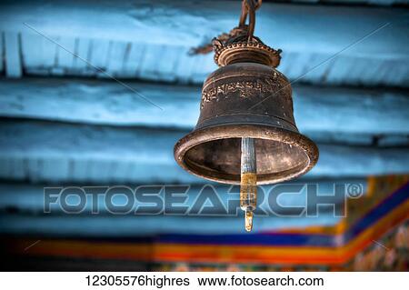 A old brass bell hangs in a Tibetan monastery; Ladakh, India View Large Photo Image Stock Photograph - A old brass bell hangs in a Tibetan monastery; Ladakh, India. Fotosearch