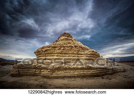 Stock Photograph - A rock formation in the wilderness located in the Jordan Valley near the Dead Sea; Israel. Fotosearch