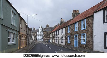 A street runs between residential buildings; Anstruther, Fife, Scotland View Large Photo Image Stock Photograph - A street runs between residential buildings; Anstruther, Fife, Scotland. Fotosearch