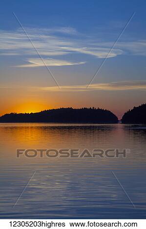 Stock Photograph - A sunset in the Gulf Islands; British Columbia, Canada. Fotosearch