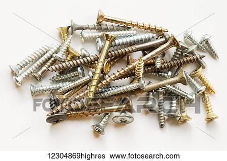 A variety of screws tossed together; Chilliwack, British Columbia, Canada View Large Photo Image Stock Photograph - A variety of screws tossed together; Chilliwack, British Columbia, Canada. Fotosearch