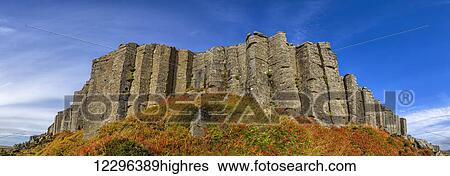 Stock Photograph - A vertical wall of solidified lava forms hexagonal shapes on the Snaefellsnes Peninsula; Iceland. Fotosearch
