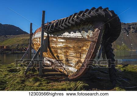 Abandoned old rowing boat on wooden blocks; Antarctica View Large Photo Image Stock Photograph - Abandoned old rowing boat on wooden blocks; Antarctica. Fotosearch